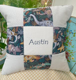 Patchwork dinosaur cushion