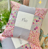 Ditsy bunnies and floral name and date cushion