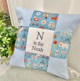 Blue woodland animals cushion