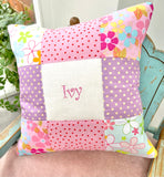 Pink and purple name cushion
