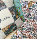 Patchwork dinosaur cushion