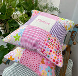 Pink and purple name cushion