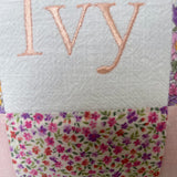 Peachy pink patchwork name cushion