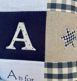 Navy blue alphabet cushion